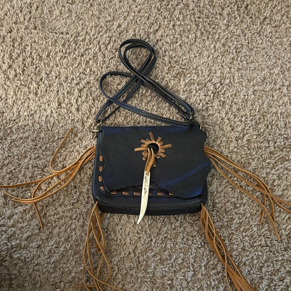 American Darling ADBGM256 8x6x1.5
Not the original strap. Strap adjustable